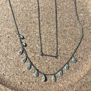 Two delicate silver necklaces. Arrow. Small dangles teardrops sparkles 2sides